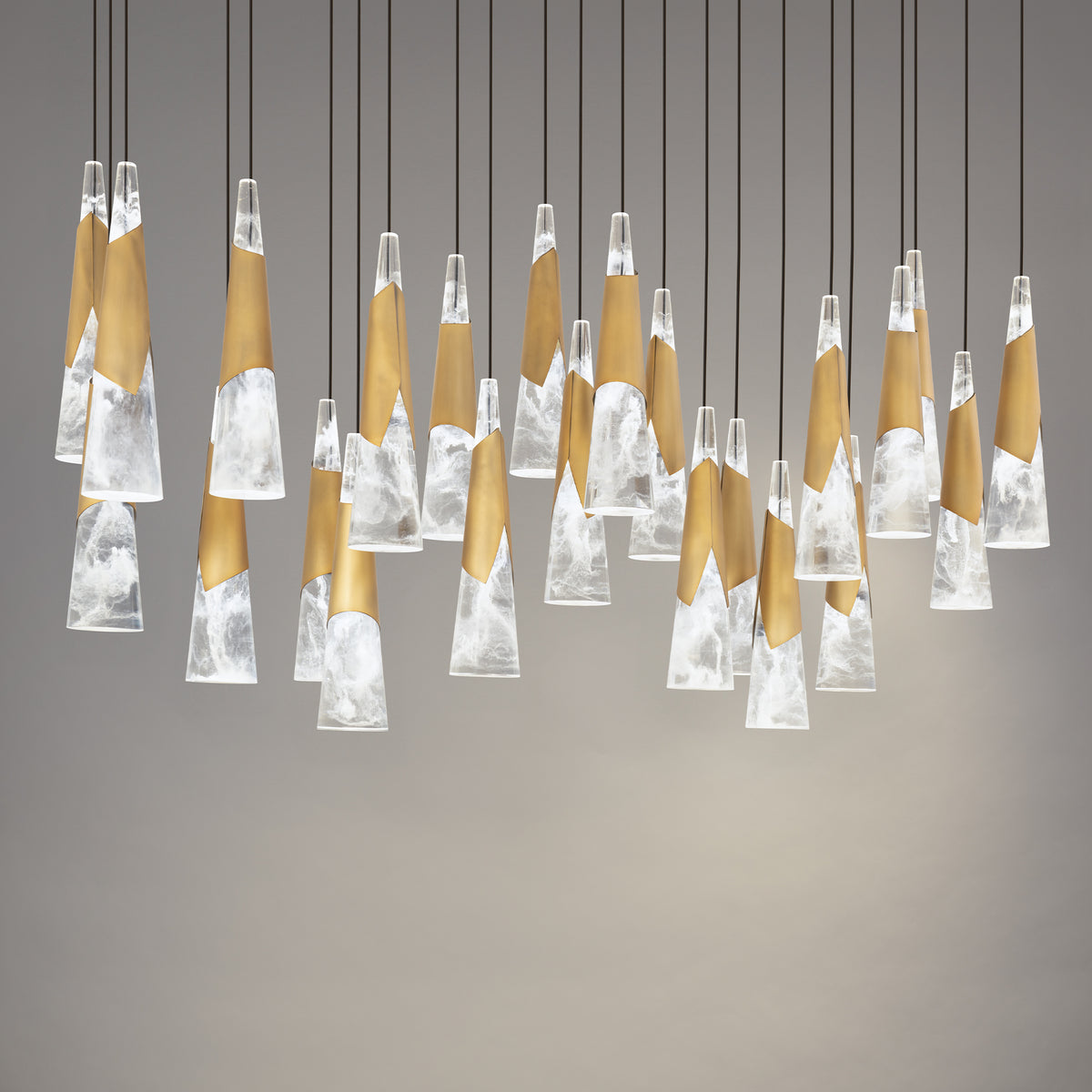 Kilt 23-Light Linear Multi Pendant - Aged Brass detail